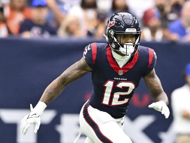 Houston Texans wide receiver Nico Collins (12) in action during an NFL football game against the Denver Broncos, Sunday, Dec 3, 2023, in Houston. (AP Photo/Maria Lysaker)