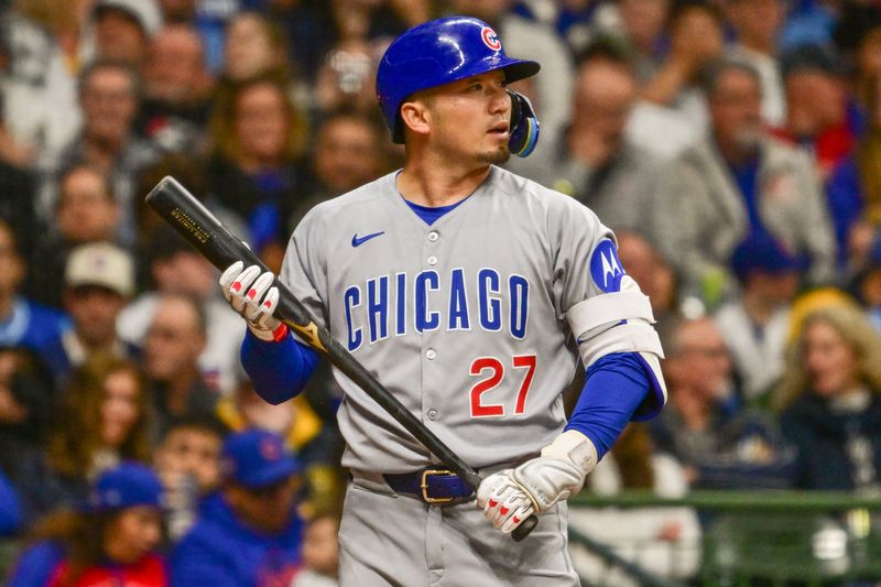 May 2, 2025; Milwaukee, Wisconsin, USA;  Chicago Cubs designated hitter Seiya Suzuki (27) gets ready to bat in the sixth inning against the Milwaukee Brewers at American Family Field. Mandatory Credit: Benny Sieu-Imagn Images
