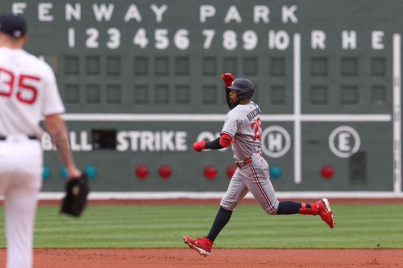 May 4, 2025; Boston, Massachusetts, USA; Minnesota Twins center fielder Byron Buxton (25) reacts after hitting a solo home run during the first inning against the Boston Red Sox at Fenway Park. Mandatory Credit: Paul Rutherford-Imagn Images