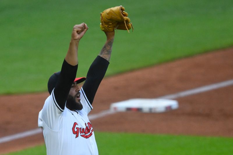 Aug 14, 2024; Cleveland, Ohio, USA; Cleveland Guardians relief pitcher Pedro Avila (60) celebrates in the fourth inning against the Chicago Cubs at Progressive Field. Mandatory Credit: David Richard-USA TODAY Sports