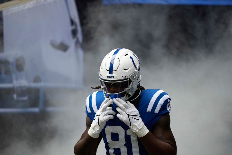 Indianapolis Colts tight end Mo Alie-Cox (81) runs to the field before an NFL football game against the Houston Texans, Sunday, Sept. 8, 2024, in Indianapolis. (AP Photo/Darron Cummings)