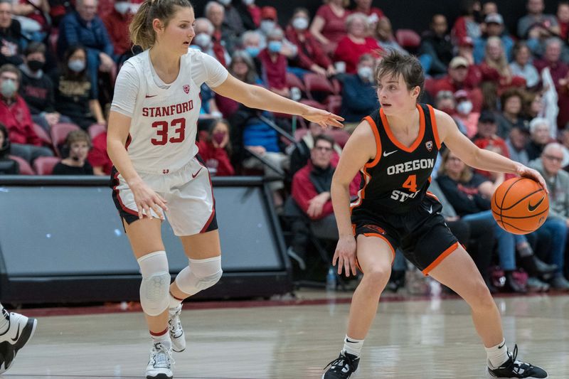 Jan 27, 2023; Stanford, California, USA; Oregon State Beavers guard Noelle Mannen (4) dribbles the basketball against Stanford Cardinal guard Hannah Jump (33) during the fourth quarter at Maples Pavilion. Mandatory Credit: Neville E. Guard-USA TODAY Sports