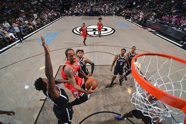 BROOKLYN, NY - NOVEMBER 26: DeMar DeRozan #11 of the Chicago Bulls drives to the basket during the game against the Brooklyn Nets on November 26, 2023 at Barclays Center in Brooklyn, New York. NOTE TO USER: User expressly acknowledges and agrees that, by downloading and or using this Photograph, user is consenting to the terms and conditions of the Getty Images License Agreement. Mandatory Copyright Notice: Copyright 2023 NBAE (Photo by Jesse D. Garrabrant/NBAE via Getty Images)