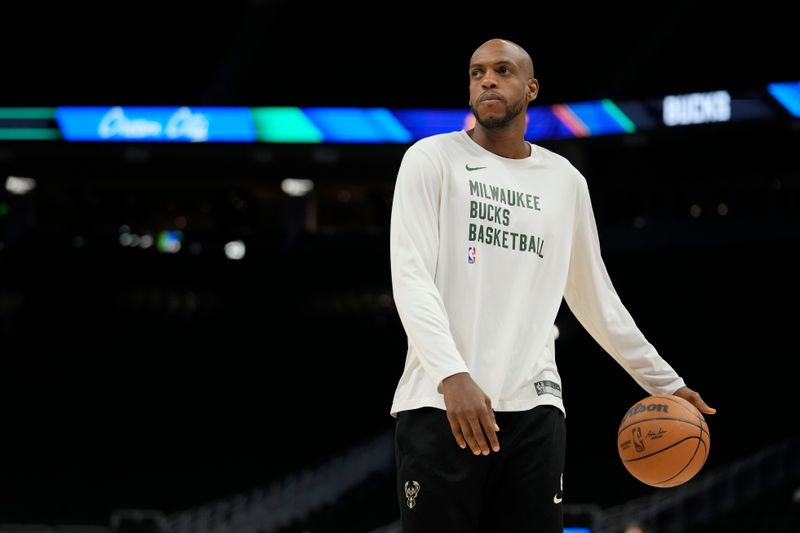 MILWAUKEE, WISCONSIN - MARCH 17: Khris Middleton #22 of the Milwaukee Bucks warms up before a game against the Phoenix Suns at Fiserv Forum on March 17, 2024 in Milwaukee, Wisconsin. NOTE TO USER: User expressly acknowledges and agrees that, by downloading and or using this photograph, User is consenting to the terms and conditions of the Getty Images License Agreement. (Photo by Patrick McDermott/Getty Images)