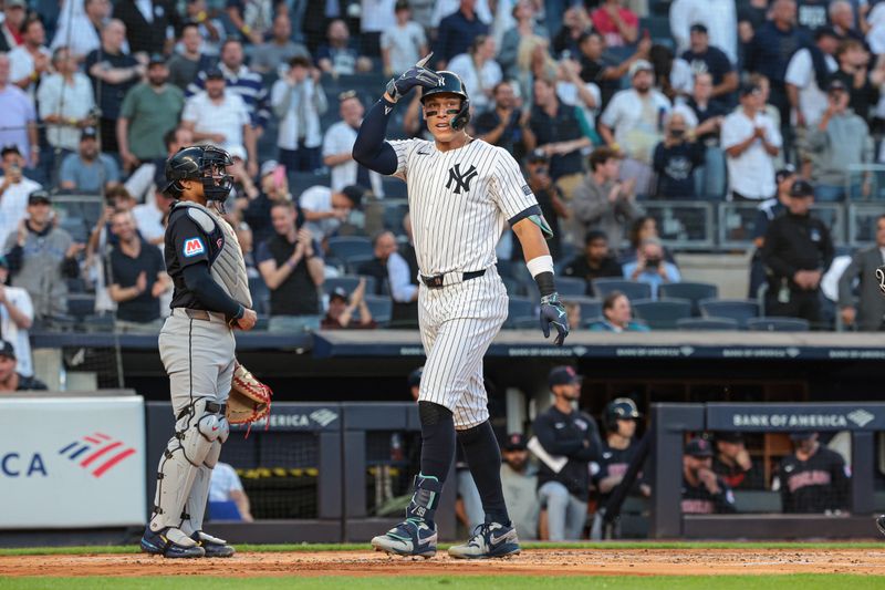 Aug 20, 2024; Bronx, New York, USA; New York Yankees center fielder Aaron Judge (99) celebrates after his solo home run during the first inning against the Cleveland Guardians at Yankee Stadium. Mandatory Credit: Vincent Carchietta-USA TODAY Sports