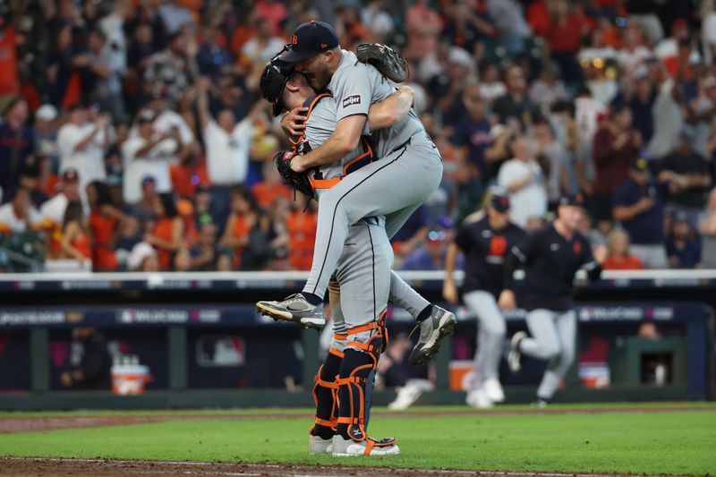 Oct 2, 2024; Houston, Texas, USA; Detroit Tigers pitcher Will Vest (19) and catcher Jake Rogers (34) celebrate after defeating the Houston Astros in game two of the Wildcard round for the 2024 MLB Playoffs at Minute Maid Park. Mandatory Credit: Thomas Shea-Imagn Images