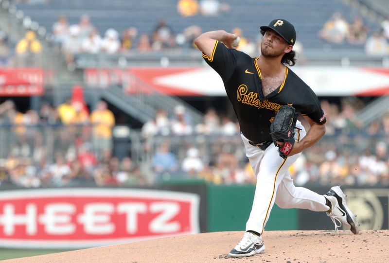 Jul 3, 2024; Pittsburgh, Pennsylvania, USA;  Pittsburgh Pirates starting pitcher Jared Jones (37) delivers a pitch against the St. Louis Cardinals during the first inning at PNC Park. Mandatory Credit: Charles LeClaire-USA TODAY Sports