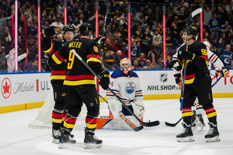 Nov 6, 2023; Vancouver, British Columbia, CAN; Edmonton Oilers goalie Stuart Skinner (74) watches as Vancouver Canucks forward Brock Boeser (6) and forward J.T. Miller (9) and forward Andrei Kuzmenko (96) celebrate Boesser s goal in the first period at Rogers Arena. Mandatory Credit: Bob Frid-USA TODAY Sports