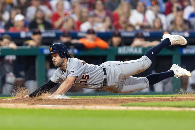 Jun 8, 2023; Philadelphia, Pennsylvania, USA; Detroit Tigers right fielder Jake Marisnick (15) slides into home plate for a run during the eighth inning against the Philadelphia Phillies at Citizens Bank Park. Mandatory Credit: Bill Streicher-USA TODAY Sports