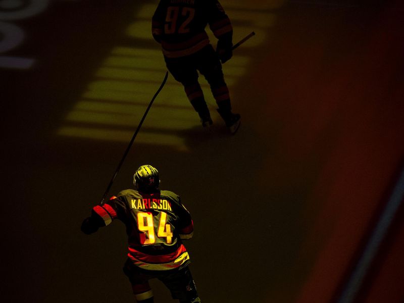 Mar 14, 2026; Vancouver, British Columbia, CAN; Vancouver Canucks forward Linus Karlsson (94) skates out prior to the start of a game against the Seattle Kraken at Rogers Arena. Mandatory Credit: Bob Frid-Imagn Images