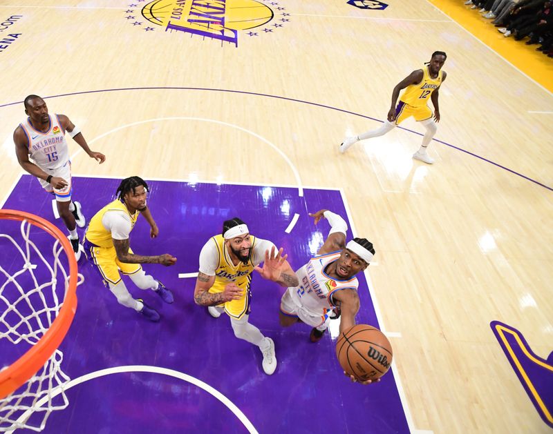 LOS ANGELES, CA - MARCH 4: Shai Gilgeous-Alexander #2 of the Oklahoma City Thunder drives to the basket during the game against the Los Angeles Lakers on March 4, 2024 at Crypto.Com Arena in Los Angeles, California. NOTE TO USER: User expressly acknowledges and agrees that, by downloading and/or using this Photograph, user is consenting to the terms and conditions of the Getty Images License Agreement. Mandatory Copyright Notice: Copyright 2024 NBAE (Photo by Adam Pantozzi/NBAE via Getty Images)