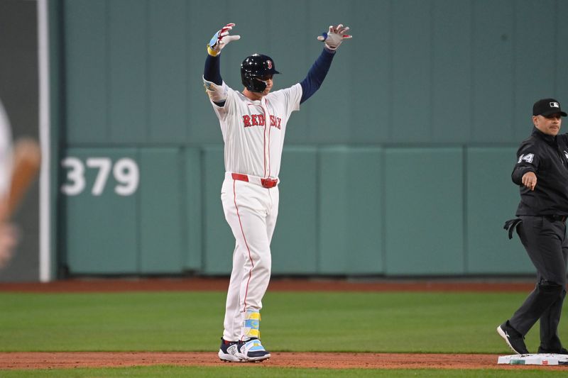 Apr 11, 20024; Boston, Massachusetts, USA; Boston Red Sox first baseman Triston Casas (36) reacts to hitting a double against the Baltimore Orioles  during the first inning at Fenway Park. Mandatory Credit: Eric Canha-USA TODAY Sports