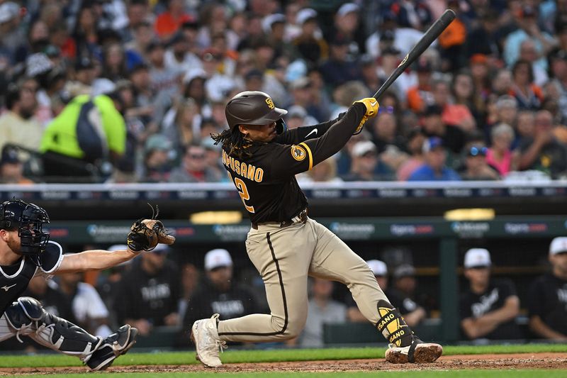 Jul 22, 2023; Detroit, Michigan, USA; San Diego Padres catcher Luis Campusano (12) hits an RBI single against the Detroit Tigers in the fifth inning at Comerica Park. Mandatory Credit: Lon Horwedel-USA TODAY Sports