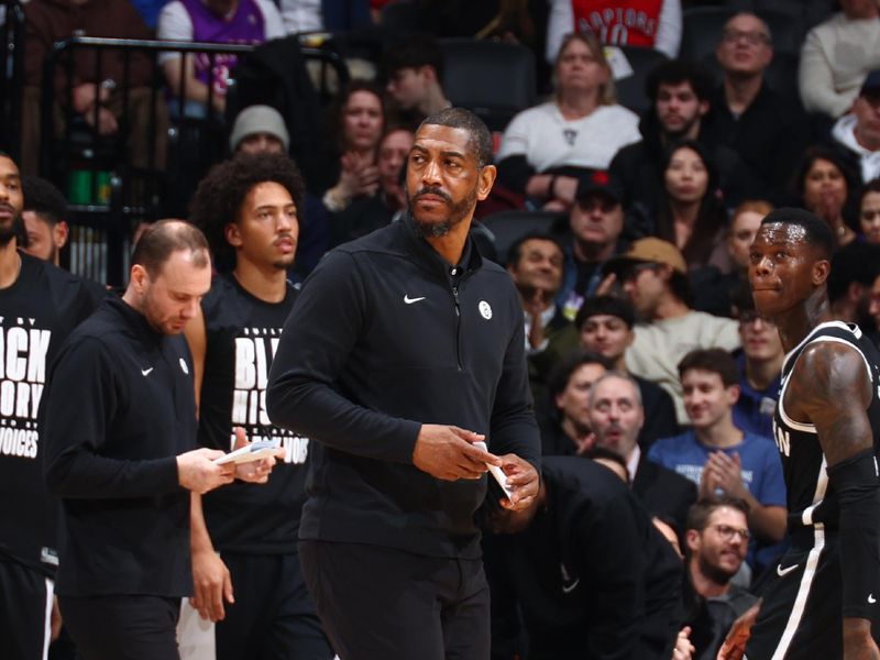 TORONTO, CANADA - FEBRUARY 22: Head Coach Kevin Ollie of the Brooklyn Nets looks on during the game against the Toronto Raptors on February 22, 2024 at the Scotiabank Arena in Toronto, Ontario, Canada.  NOTE TO USER: User expressly acknowledges and agrees that, by downloading and or using this Photograph, user is consenting to the terms and conditions of the Getty Images License Agreement.  Mandatory Copyright Notice: Copyright 2024 NBAE (Photo by Vaughn Ridley/NBAE via Getty Images)