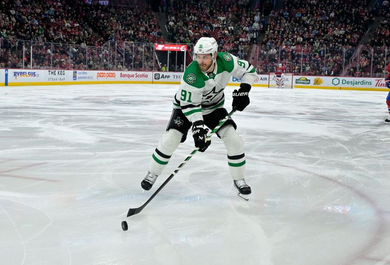 Feb 10, 2024; Montreal, Quebec, CAN; Dallas Stars forward Tyler Seguin (91) controls the puck against the Montreal Canadiens during the second period at the Bell Centre. Mandatory Credit: Eric Bolte-USA TODAY Sports