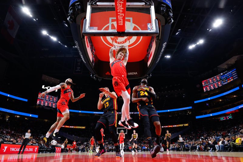 ATLANTA, GEORGIA - FEBRUARY 23: Gradey Dick #1 of the Toronto Raptors dunks during the first half against the Atlanta Hawks at State Farm Arena on February 23, 2024 in Atlanta, Georgia. NOTE TO USER: User expressly acknowledges and agrees that, by downloading and or using this photograph, User is consenting to the terms and conditions of the Getty Images License Agreement. (Photo by Todd Kirkland/Getty Images)