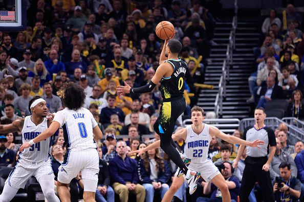 INDIANAPOLIS, INDIANA - DECEMBER 23: Tyrese Haliburton #0 of the Indiana Pacers takes a shot during the first half in the game against the Orlando Magic at Gainbridge Fieldhouse on December 23, 2023 in Indianapolis, Indiana. NOTE TO USER: User expressly acknowledges and agrees that, by downloading and or using this photograph, User is consenting to the terms and conditions of the Getty Images License Agreement. (Photo by Justin Casterline/Getty Images)