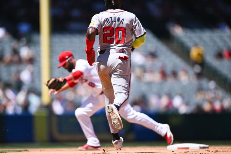 Aug 18, 2024; Anaheim, California, USA; Los Angeles Angels second baseman Michael Stefanic (38) at second base against Atlanta Braves designated hitter Marcell Ozuna (20) during the fifth inning at Angel Stadium. Mandatory Credit: Jonathan Hui-USA TODAY Sports