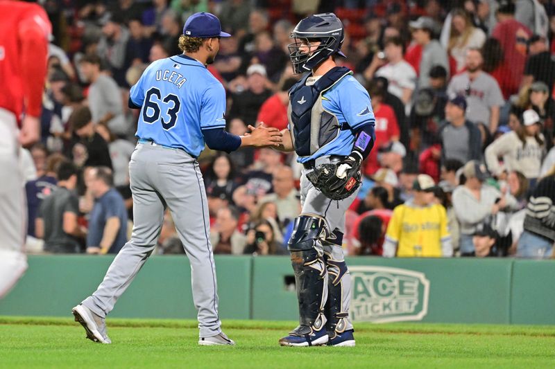 Sep 27, 2024; Boston, Massachusetts, USA; Tampa Bay Rays pitcher Edwin Uceta (63) celebrates after defeating the Boston Red Sox at Fenway Park. Mandatory Credit: Eric Canha-Imagn Images