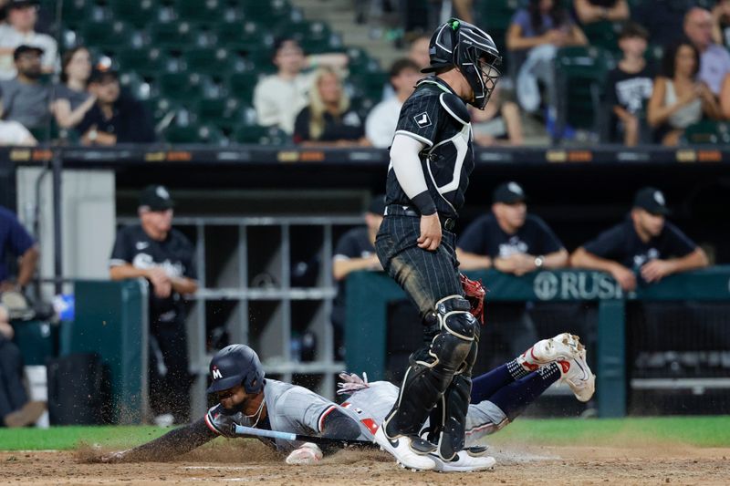 Jul 8, 2024; Chicago, Illinois, USA; Minnesota Twins outfielder Byron Buxton (25) scores against the Chicago White Sox during the 11th inning at Guaranteed Rate Field. Mandatory Credit: Kamil Krzaczynski-USA TODAY Sports