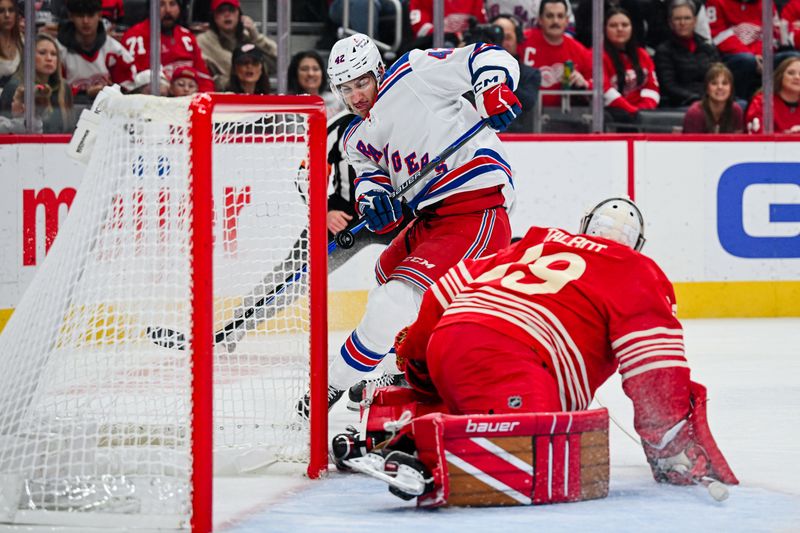 Nov 7, 2025; Detroit, Michigan, USA; Detroit Red Wings goaltender Cam Talbot (39) makes a save on New York Rangers center Noah Laba (42) during the first period at Little Caesars Arena. Mandatory Credit: Tim Fuller-Imagn Images