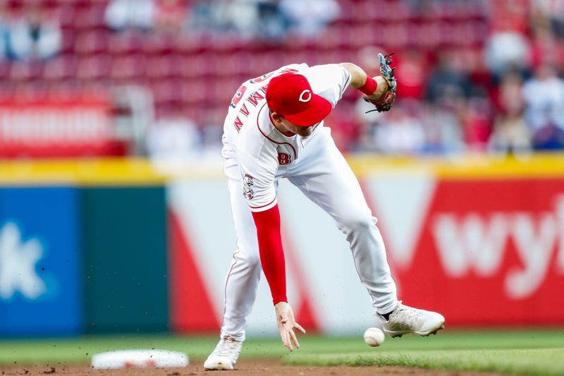 Apr 18, 2023; Cincinnati, Ohio, USA; Cincinnati Reds shortstop Kevin Newman (28) fields a ball hit by Tampa Bay Rays catcher Francisco Mejia (not pictured) in the second inning at Great American Ball Park. Mandatory Credit: Katie Stratman-USA TODAY Sports