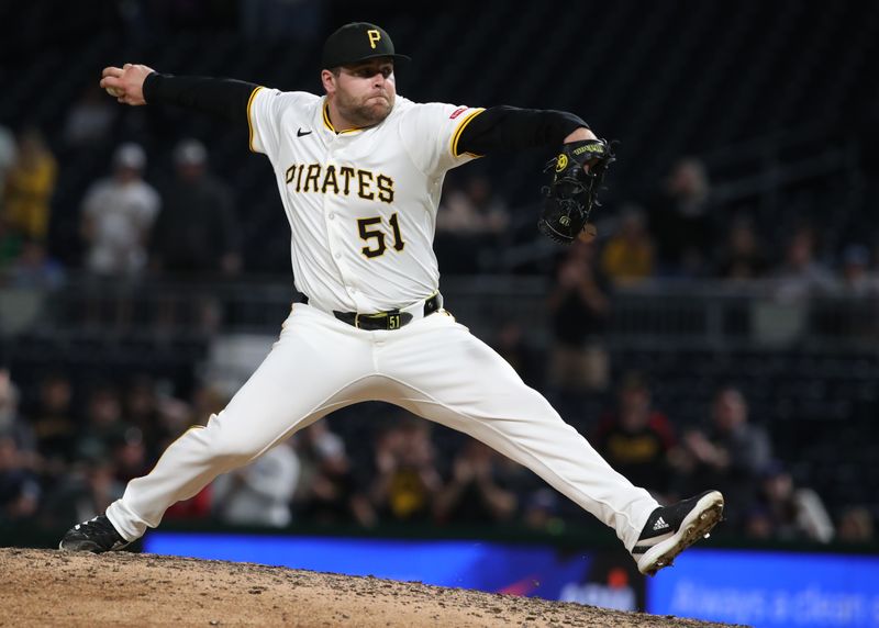 Apr 30, 2025; Pittsburgh, Pennsylvania, USA;  Pittsburgh Pirates relief pitcher David Bednar (51) pitches against the Chicago Cubs during the ninth inning at PNC Park. Mandatory Credit: Charles LeClaire-Imagn Images