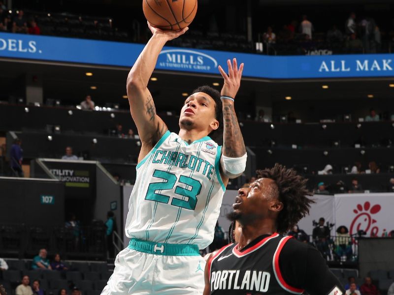 CHARLOTTE, NC - APRIL 3: Tre Mann #23 of the  Charlotte Hornets goes to the basket during the game on April 3, 2024 at Spectrum Center in Charlotte, North Carolina. NOTE TO USER: User expressly acknowledges and agrees that, by downloading and or using this photograph, User is consenting to the terms and conditions of the Getty Images License Agreement. Mandatory Copyright Notice: Copyright 2024 NBAE (Photo by Kent Smith/NBAE via Getty Images)