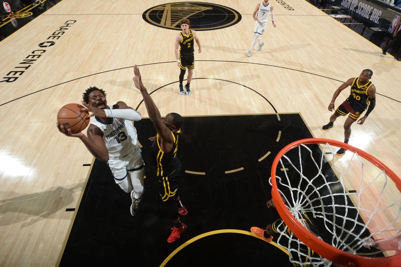 SAN FRANCISCO, CA - MARCH 20: Jaren Jackson Jr. #13 of the Memphis Grizzlies drives to the basket during the game against the Golden State Warriors on March 20, 2024 at Chase Center in San Francisco, California. NOTE TO USER: User expressly acknowledges and agrees that, by downloading and or using this photograph, user is consenting to the terms and conditions of Getty Images License Agreement. Mandatory Copyright Notice: Copyright 2024 NBAE (Photo by Noah Graham/NBAE via Getty Images)