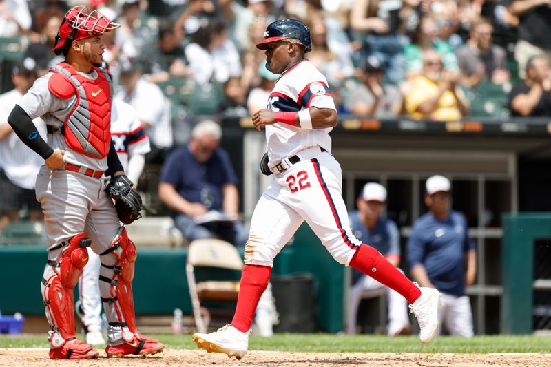 Jul 9, 2023; Chicago, Illinois, USA; Chicago White Sox right fielder Oscar Colas (22) scores against the St. Louis Cardinals during the third inning at Guaranteed Rate Field. Mandatory Credit: Kamil Krzaczynski-USA TODAY Sports