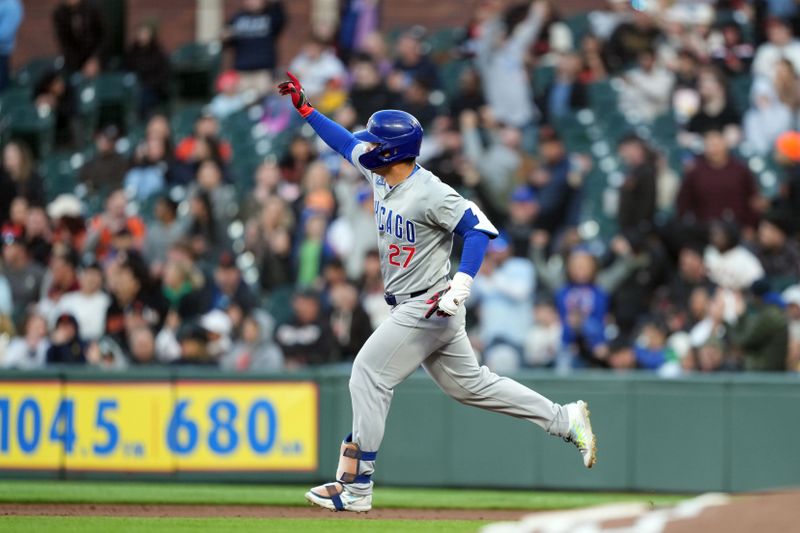 Jun 26, 2024; San Francisco, California, USA; Chicago Cubs designated hitter Seiya Suzuki (27) gestures while rounding the bases after hitting a home run against the San Francisco Giants during the fifth inning at Oracle Park. Mandatory Credit: Darren Yamashita-USA TODAY Sports