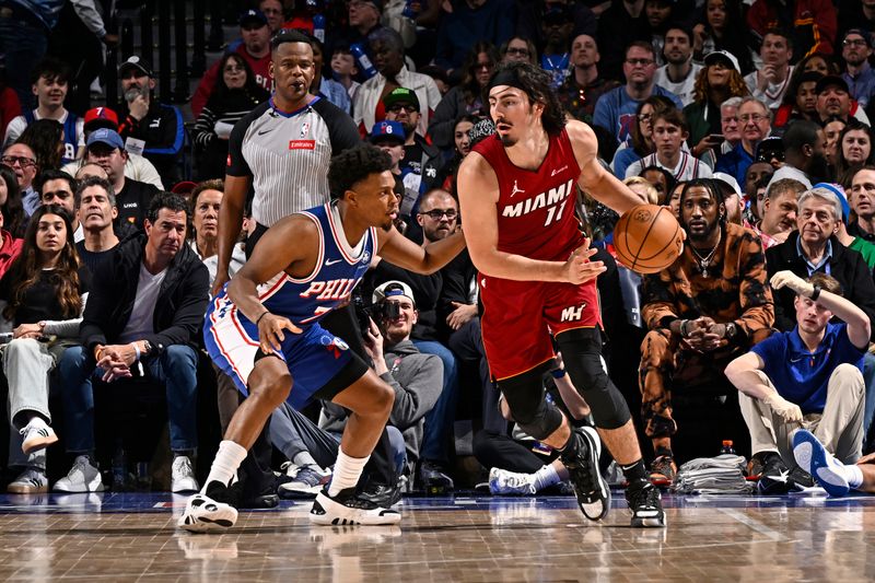 PHILADELPHIA, PA - MARCH 18: Jaime Jaquez Jr. #11 of the Miami Heat dribbles the ball during the game against the Philadelphia 76ers on March 18, 2024 at the Wells Fargo Center in Philadelphia, Pennsylvania NOTE TO USER: User expressly acknowledges and agrees that, by downloading and/or using this Photograph, user is consenting to the terms and conditions of the Getty Images License Agreement. Mandatory Copyright Notice: Copyright 2024 NBAE (Photo by David Dow/NBAE via Getty Images)