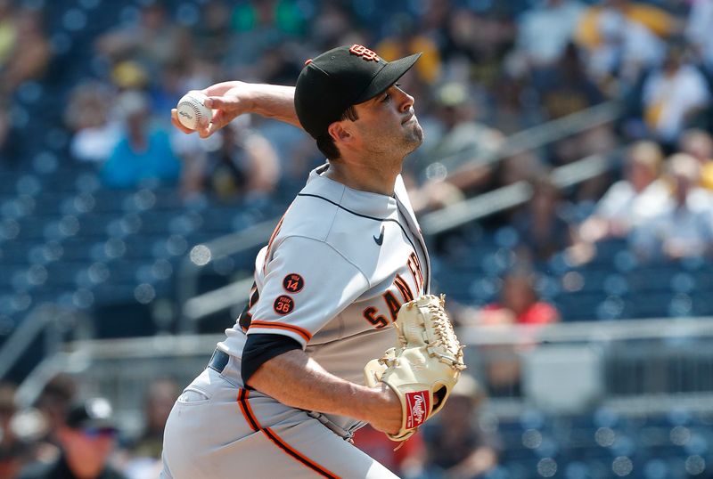 Jul 16, 2023; Pittsburgh, Pennsylvania, USA;  San Francisco Giants relief pitcher Scott Alexander (54) pitches against the Pittsburgh Pirates during the tenth inning at PNC Park. Mandatory Credit: Charles LeClaire-USA TODAY Sports