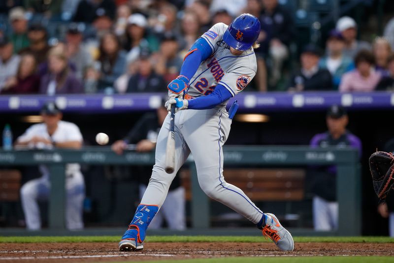 May 26, 2023; Denver, Colorado, USA; New York Mets third baseman Brett Baty (22) hits an RBI single in the fifth inning against the Colorado Rockies at Coors Field. Mandatory Credit: Isaiah J. Downing-USA TODAY Sports