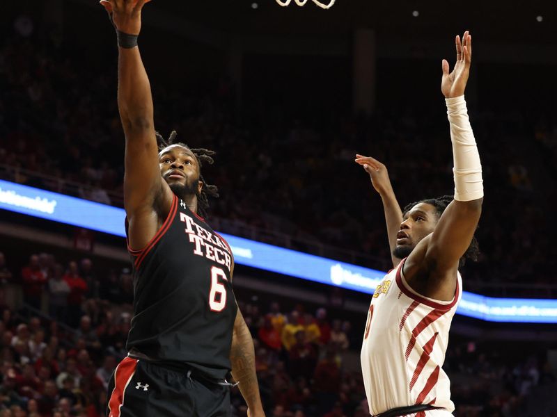 Feb 17, 2024; Ames, Iowa, USA; Texas Tech Red Raiders guard Joe Toussaint (6) scores in front of Iowa State Cyclones forward Milan Momcilovic (22) during the second half at James H. Hilton Coliseum. Mandatory Credit: Reese Strickland-USA TODAY Sports