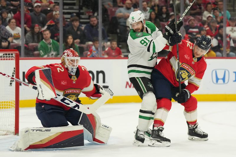 Dec 6, 2023; Sunrise, Florida, USA; Florida Panthers goaltender Sergei Bobrovsky (72) makes a save as Dallas Stars center Tyler Seguin (91) and defenseman Brandon Montour (62) battle for position during the first period at Amerant Bank Arena. Mandatory Credit: Jim Rassol-USA TODAY Sports