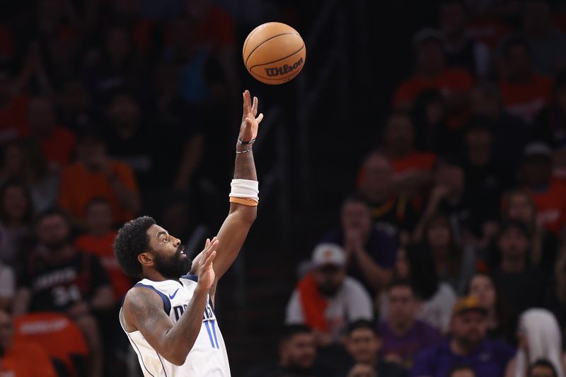 PHOENIX, ARIZONA - OCTOBER 26: Kyrie Irving #11 of the Dallas Mavericks attempts a shot against the Phoenix Suns during the first half of the NBA game at Footprint Center on October 26, 2024 in Phoenix, Arizona. The Suns defeated the Mavericks 114-102. <p><br/></p> NOTE TO USER: User expressly acknowledges and agrees that, by downloading and/or using this photograph, user is consenting to the terms and conditions of the Getty Images License Agreement. (Photo by Christian Petersen/Getty Images)