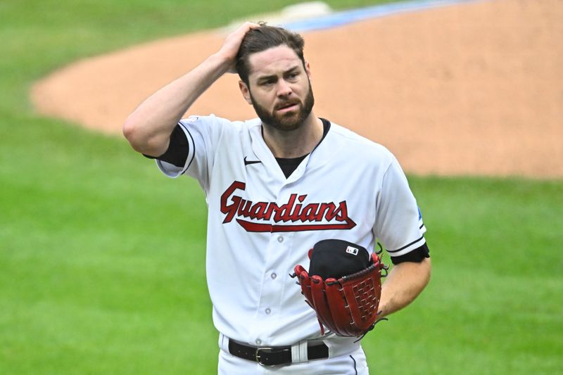 Sep 26, 2023; Cleveland, Ohio, USA; Cleveland Guardians starting pitcher Lucas Giolito (27) walks off the field after the first inning against the Cincinnati Reds at Progressive Field. Mandatory Credit: David Richard-USA TODAY Sports