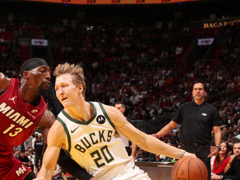 MIAMI, FL - NOVEMBER 26: AJ Green #20 of the Milwaukee Bucks handles the ball during the game against the Miami Heat during the Emirates NBA Cup game on November 26, 2024 at Kaseya Center in Miami, Florida. NOTE TO USER: User expressly acknowledges and agrees that, by downloading and or using this Photograph, user is consenting to the terms and conditions of the Getty Images License Agreement. Mandatory Copyright Notice: Copyright 2024 NBAE (Photo by Issac Baldizon/NBAE via Getty Images)