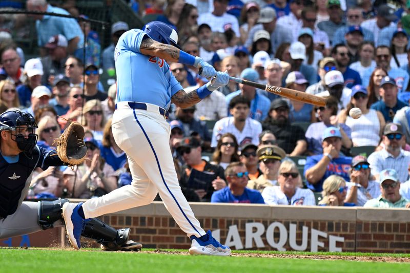 Sep 12, 2025; Chicago, Illinois, USA;  Chicago Cubs  designated hitter Moises Ballesteros (25) hits an RBI triple during the third inning against the Tampa Bay Rays at Wrigley Field. Mandatory Credit: Matt Marton-Imagn Images