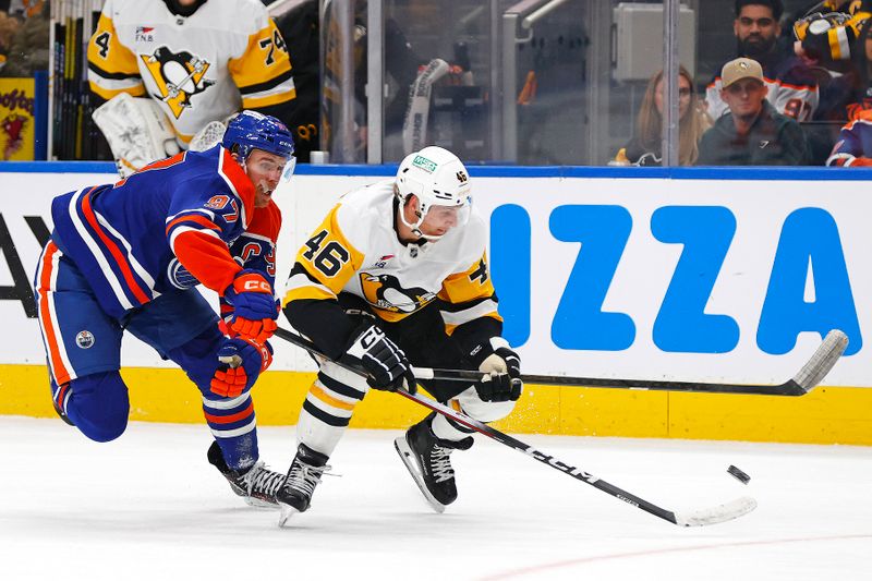 Jan 22, 2026; Edmonton, Alberta, CAN;  Edmonton Oilers forward Connor McDavid (97) tries to knock the puck away from Pittsburgh Penguins forward Blake Lizotte (46) during the second period at Rogers Place. Mandatory Credit: Perry Nelson-Imagn Images