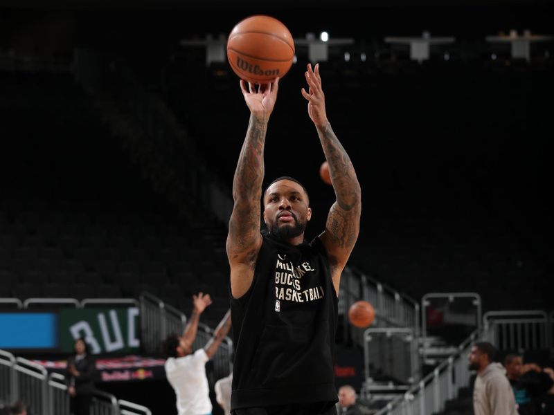 MILWAUKEE, WI - FEBRUARY 9: Damian Lillard #0 of the Milwaukee Bucks warms up before the game against the Charlotte Hornets on February 9, 2024 at the Fiserv Forum Center in Milwaukee, Wisconsin. NOTE TO USER: User expressly acknowledges and agrees that, by downloading and or using this Photograph, user is consenting to the terms and conditions of the Getty Images License Agreement. Mandatory Copyright Notice: Copyright 2024 NBAE (Photo by Gary Dineen/NBAE via Getty Images).