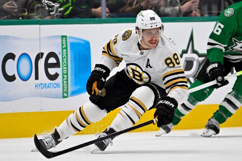 Nov 6, 2023; Dallas, Texas, USA; Boston Bruins right wing David Pastrnak (88) skates against the Dallas Stars during the first period at the American Airlines Center. Mandatory Credit: Jerome Miron-USA TODAY Sports