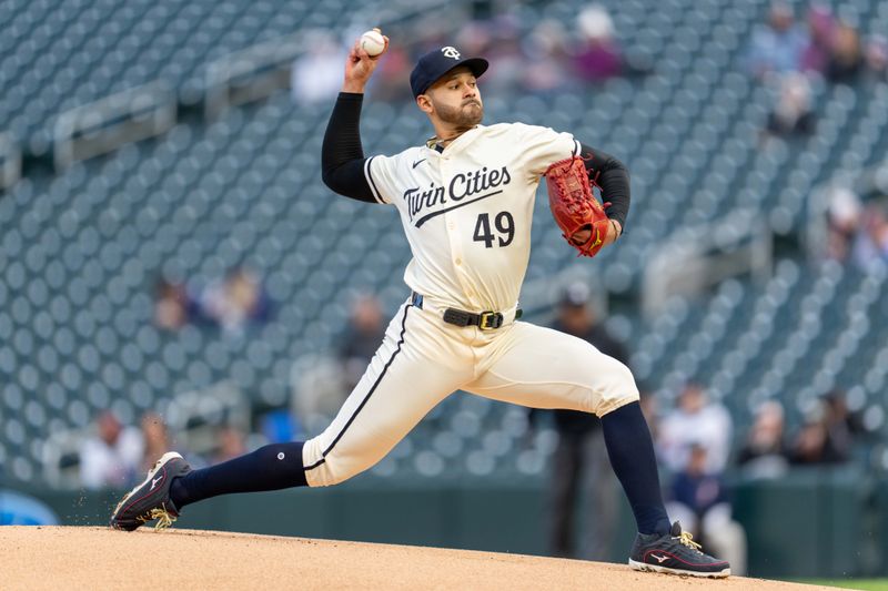 Apr 23, 2024; Minneapolis, Minnesota, USA; Minnesota Twins pitcher Pablo Lopez (49) pitches against the Chicago White Sox in the first inning at Target Field. Mandatory Credit: Matt Blewett-USA TODAY Sports