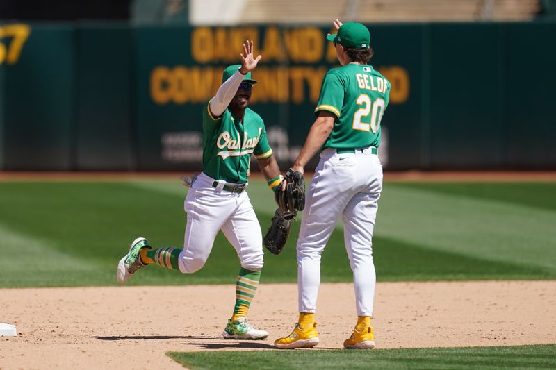 Aug 9, 2023; Oakland, California, USA; Oakland Athletics outfielder Tony Kemp (5) celebrates with second baseman Zack Gelof (20) after defeating the Texas Rangers at Oakland-Alameda County Coliseum. Mandatory Credit: Cary Edmondson-USA TODAY Sports