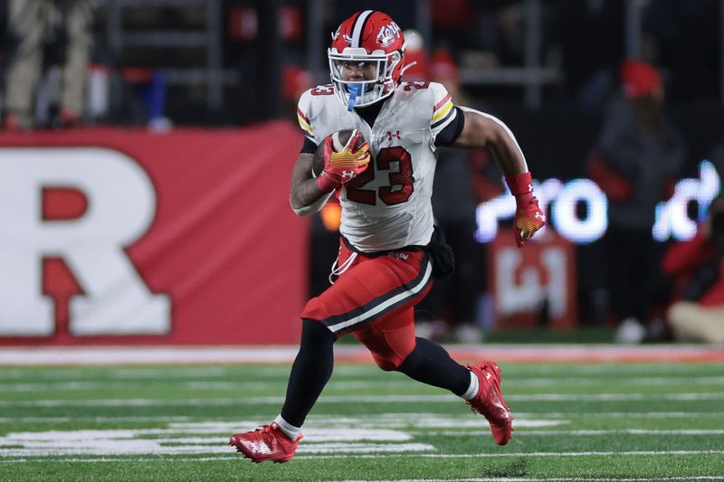 Nov 25, 2023; Piscataway, New Jersey, USA; Maryland Terrapins running back Colby McDonald (23) carries the ball during the second half against the Rutgers Scarlet Knights at SHI Stadium. Mandatory Credit: Vincent Carchietta-USA TODAY Sports