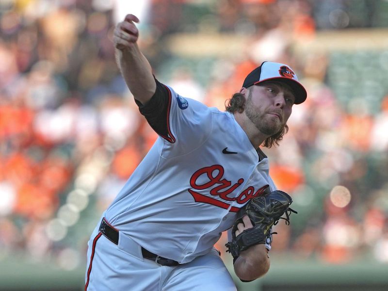 Jun 27, 2024; Baltimore, Maryland, USA; Baltimore Orioles pitcher Corbin Burnes (39) pitches in the first inning against the Texas Rangers at Oriole Park at Camden Yards. Mandatory Credit: Mitch Stringer-USA TODAY Sports