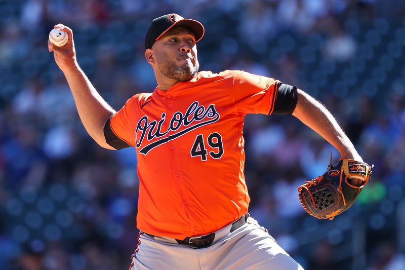 Sep 29, 2024; Minneapolis, Minnesota, USA; Baltimore Orioles starting pitcher Albert Suarez (49) delivers a pitch against the Minnesota Twins during the first inning at Target Field. Mandatory Credit: Matt Krohn-Imagn Images