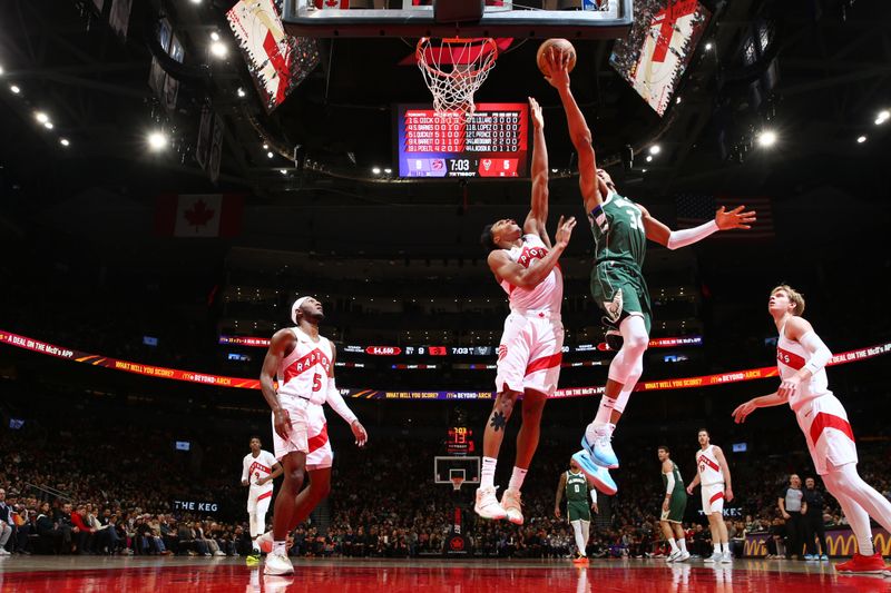 TORONTO, CANADA - JANUARY 6: Giannis Antetokounmpo #34 of the Milwaukee Bucks drives to the basket during the game against the Toronto Raptors on January 6, 2025 at the Scotiabank Arena in Toronto, Ontario, Canada.  NOTE TO USER: User expressly acknowledges and agrees that, by downloading and or using this Photograph, user is consenting to the terms and conditions of the Getty Images License Agreement.  Mandatory Copyright Notice: Copyright 2025 NBAE (Photo by Vaughn Ridley/NBAE via Getty Images)