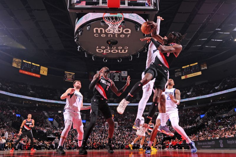 PORTLAND, OR - DECEMBER 1: Jerami Grant #9 of the Portland Trail Blazers passes the ball during the game against the Dallas Mavericks on December 1, 2024 at the Moda Center Arena in Portland, Oregon. NOTE TO USER: User expressly acknowledges and agrees that, by downloading and or using this photograph, user is consenting to the terms and conditions of the Getty Images License Agreement. Mandatory Copyright Notice: Copyright 2024 NBAE (Photo by Cameron Browne/NBAE via Getty Images)